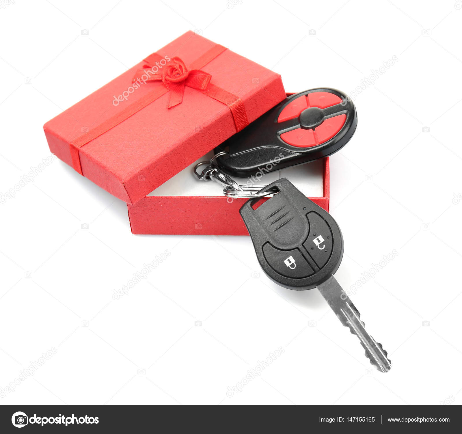 Gift box with car key — Stock Photo © belchonock 147155165
