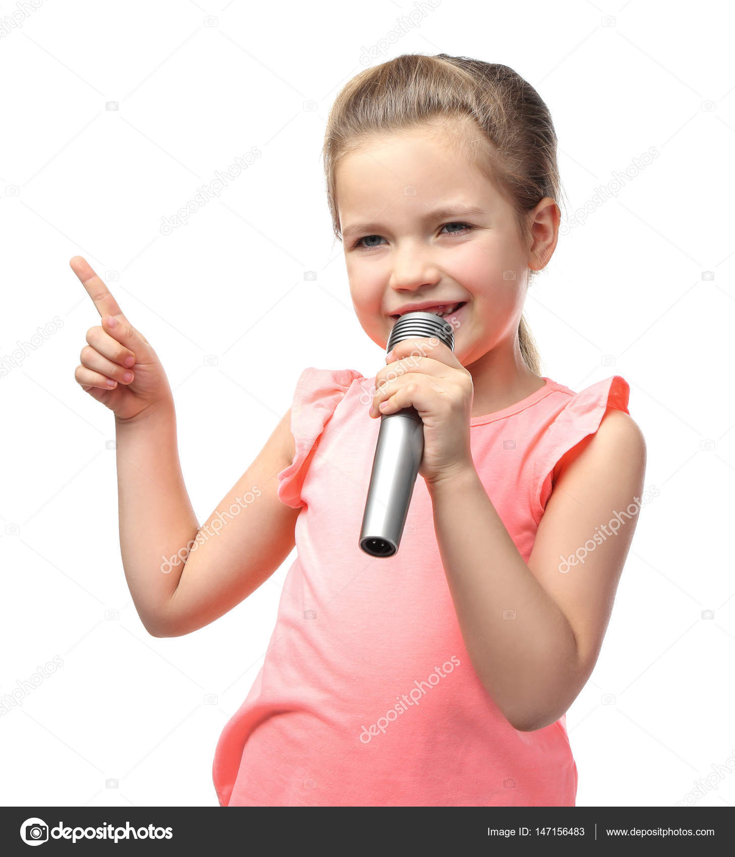 Linda niña con micrófono: fotografía de stock © belchonock