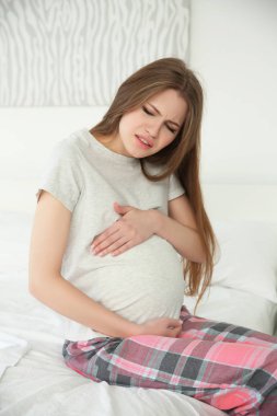 hamile kadının karın ağrısı acı