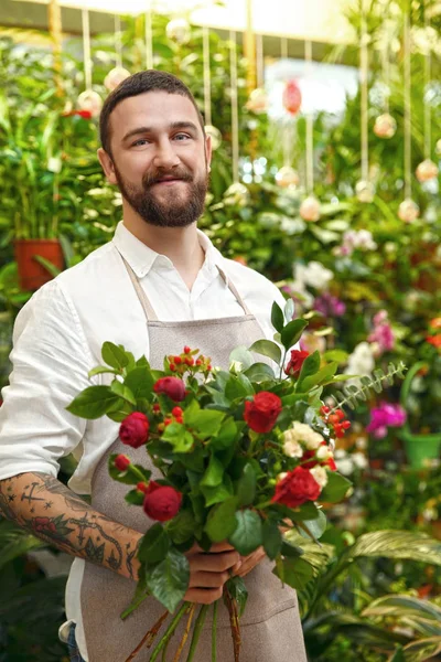 Handsome bearded florist — Stock Photo, Image