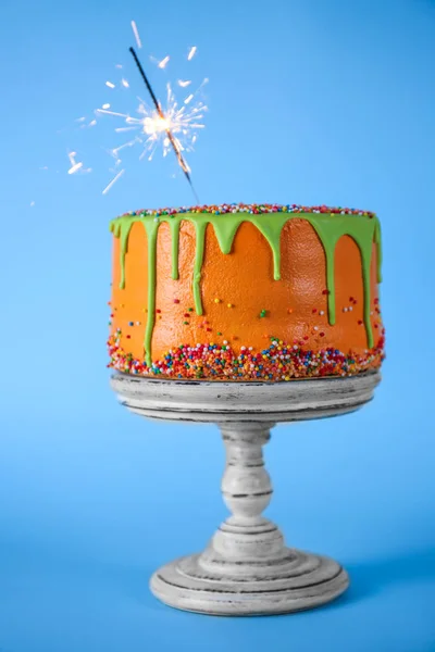 Delicious cake with sparkler — Stock Photo, Image