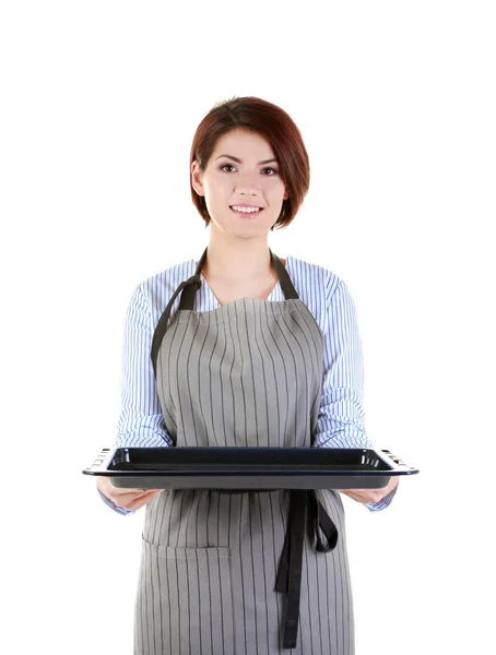 Mujer joven sosteniendo bandeja para hornear — Foto de Stock