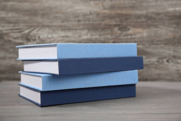 blue Books stacked 