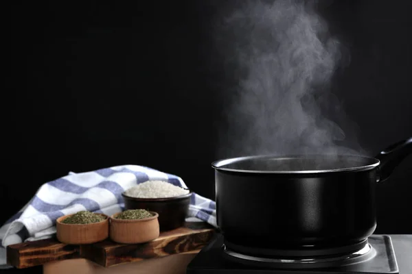 Metal pan with boiling water — Stock Photo, Image