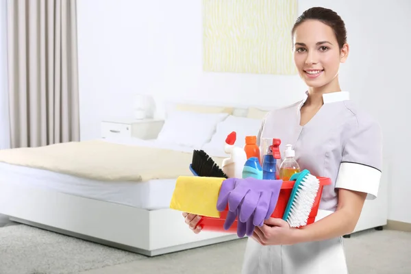 Chambermaid with cleaning equipment — Stock Photo, Image