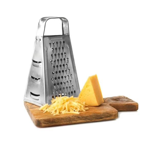 Board with metal grater and cheese — Stock Photo, Image