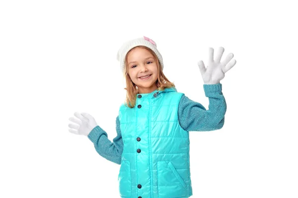 Cute little girl in warm clothes on white background — Stock Photo, Image