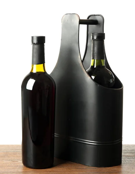 Tabell med vinflaskor och presentbox — Stockfoto