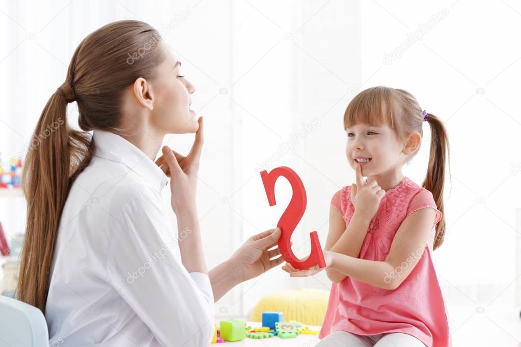 girl at speech therapist office