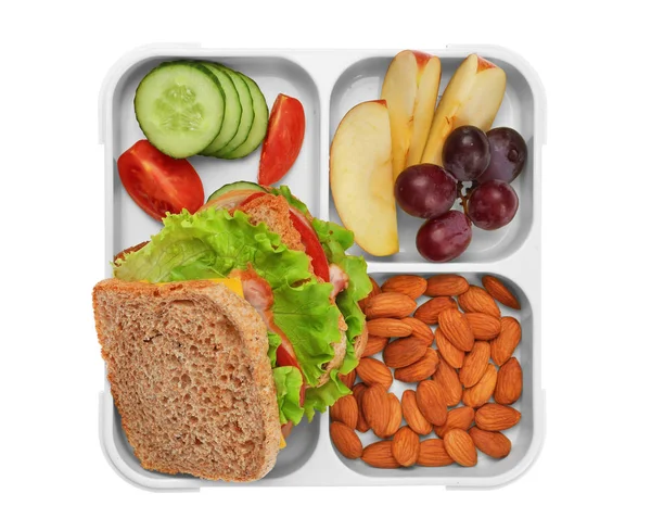 Lunchbox mit leckerem Essen auf weißem Hintergrund — Stockfoto