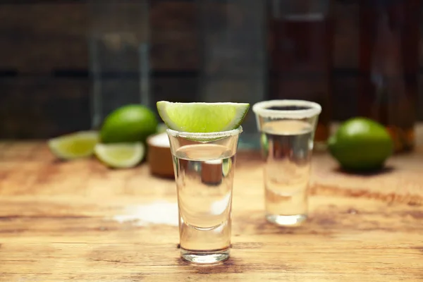 Tequila shot with juicy lime — Stock Photo, Image