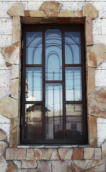 Large window with metal mesh — Stock Photo, Image