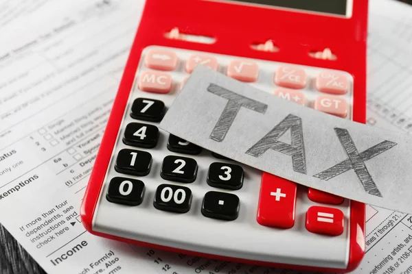 Foglio di carta con testo TAX — Foto Stock