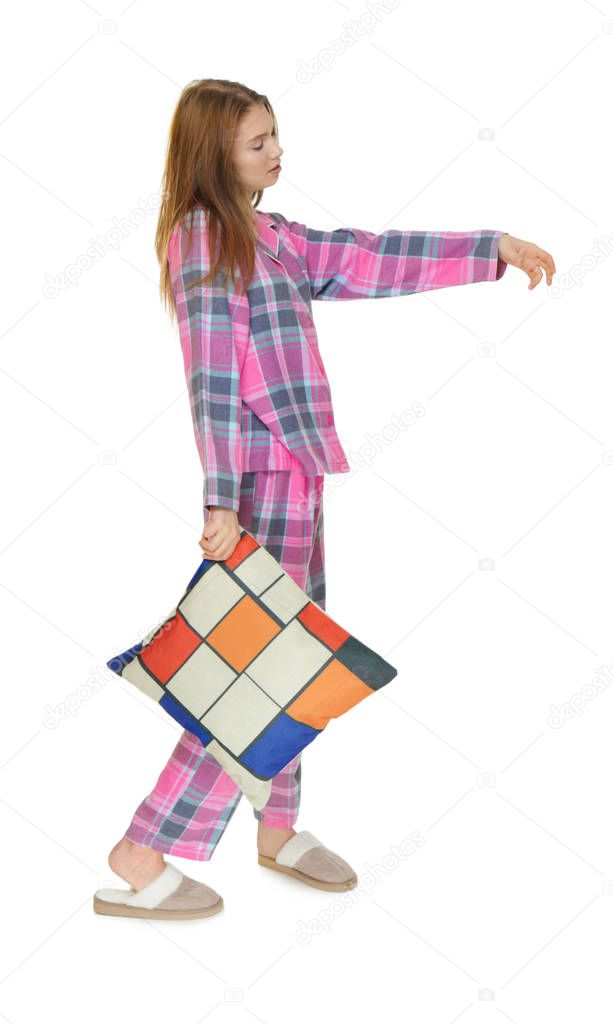 Young sleepy woman with pillow suffering from somnambulism on white background