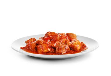 Plaka ile üstüne beyaz izole lezzetli tavuk tikka masala