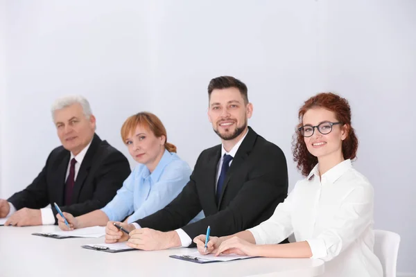 Group of business people in elegant suits — Stock Photo, Image