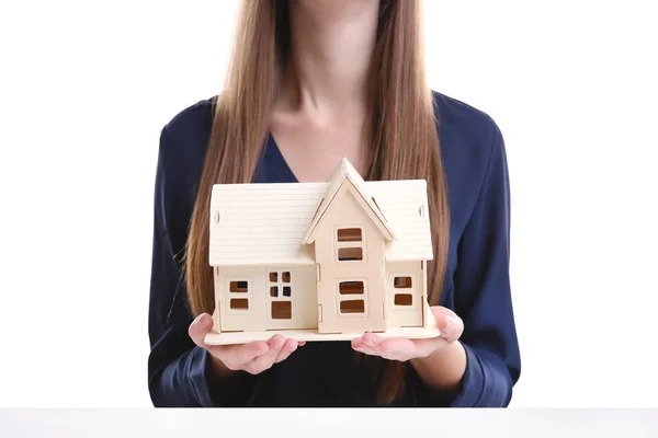 Woman holding house model — Stock Photo, Image