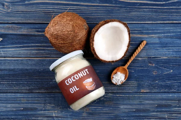 Glass jar with fresh coconut oil — Stock Photo, Image