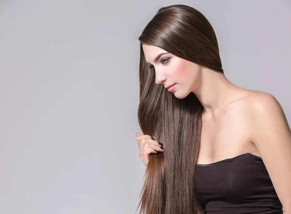 Woman with long straight hair — Stock Photo, Image