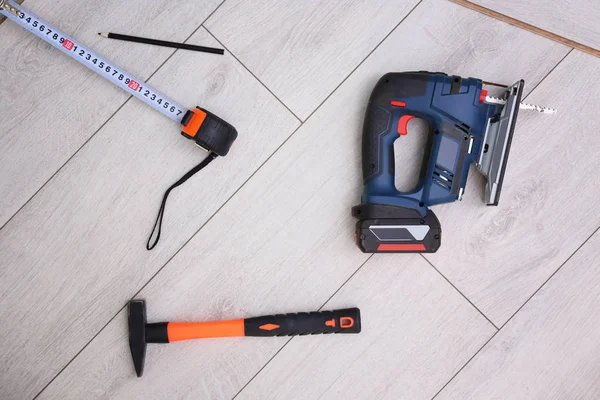 Laminate installing equipment — Stock Image Laminate installing equipment Royalty Free Stock Photos