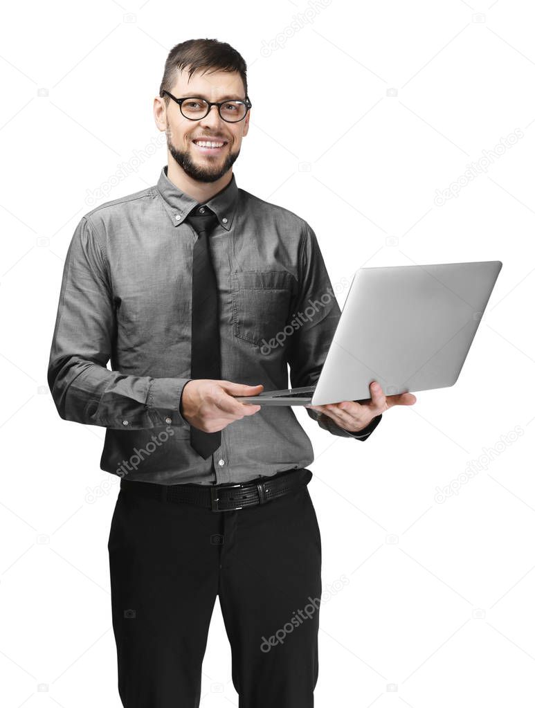 Handsome programmer with laptop on white background