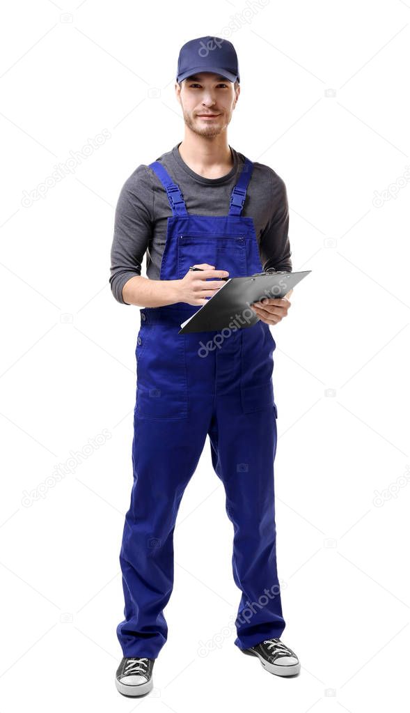 plumber in uniform holding clipboard