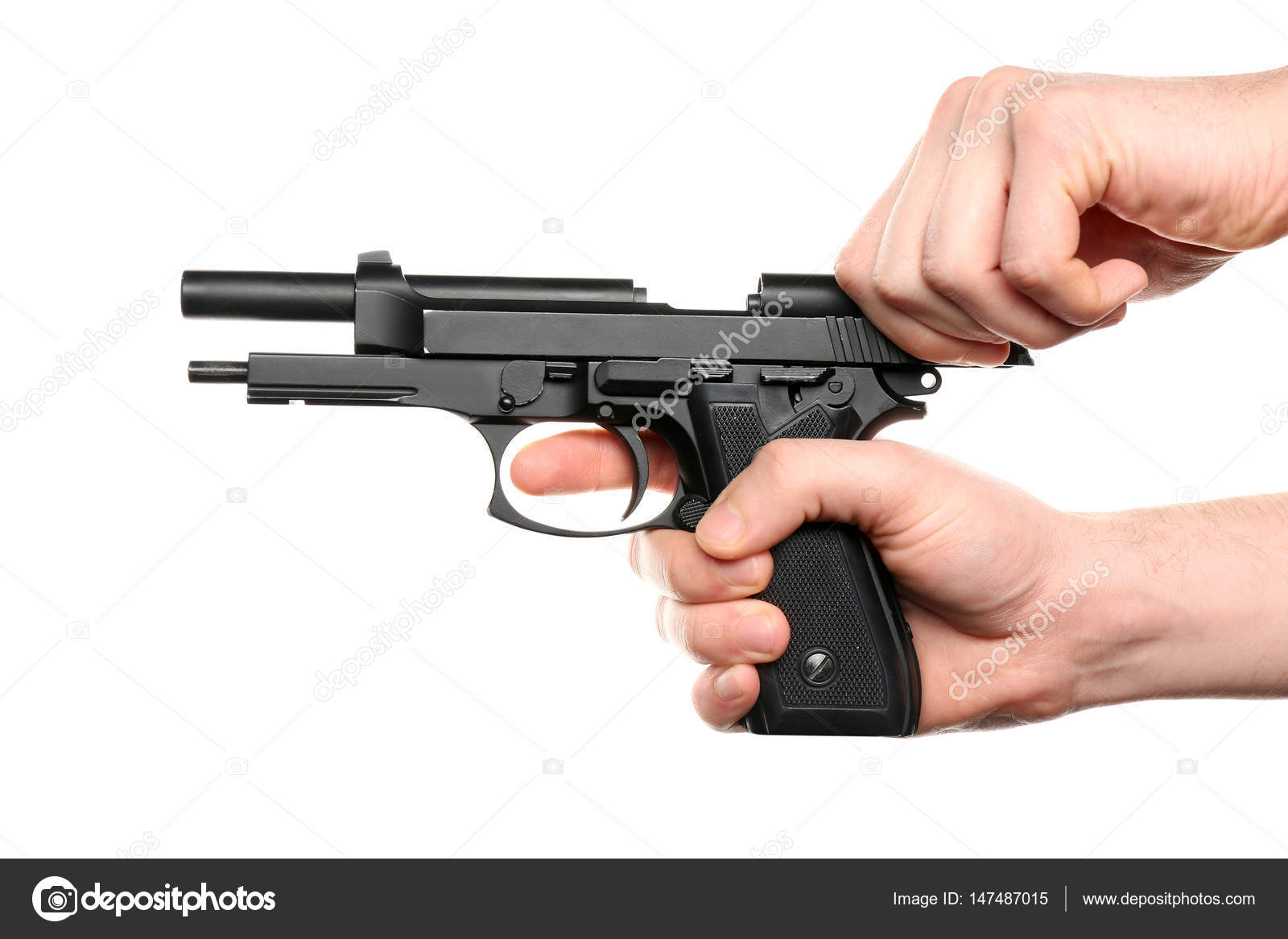 Man's hand holding gun Stock Photo by ©belchonock 147487015