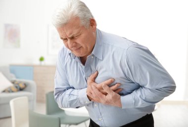 Man suffering from heart attack   clipart