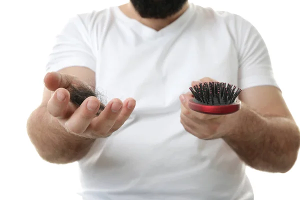 Homem com escova de cabelo — Fotografia de Stock
