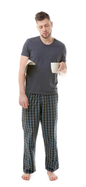 Jeune homme endormi en pyjama — Photo