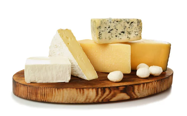 Assortment of cheese on wooden board — Stock Photo, Image