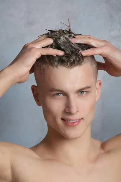 man washing hair