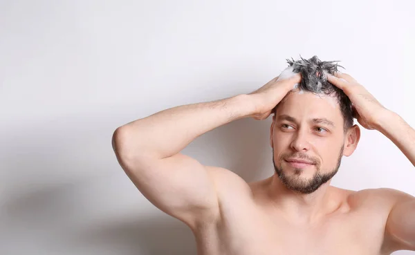 man washing hair