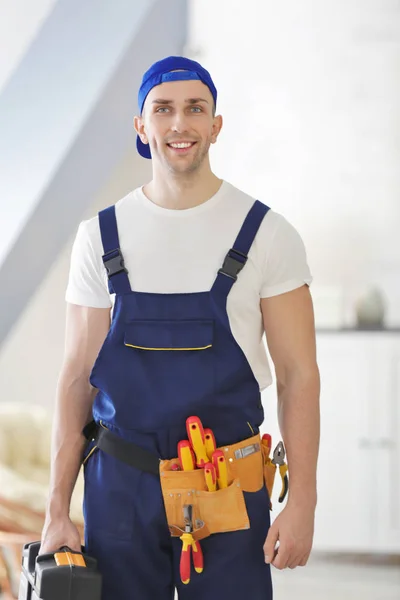 Young electrician with tools — Stock Photo, Image