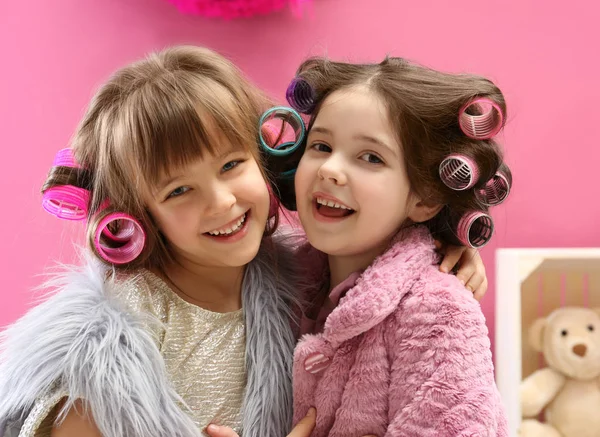 Cute little girls playing with their mother's stuff at home — Stock Photo, Image