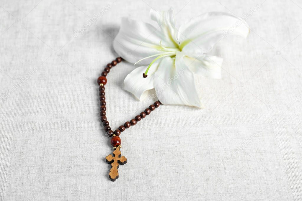 White lily and rosary