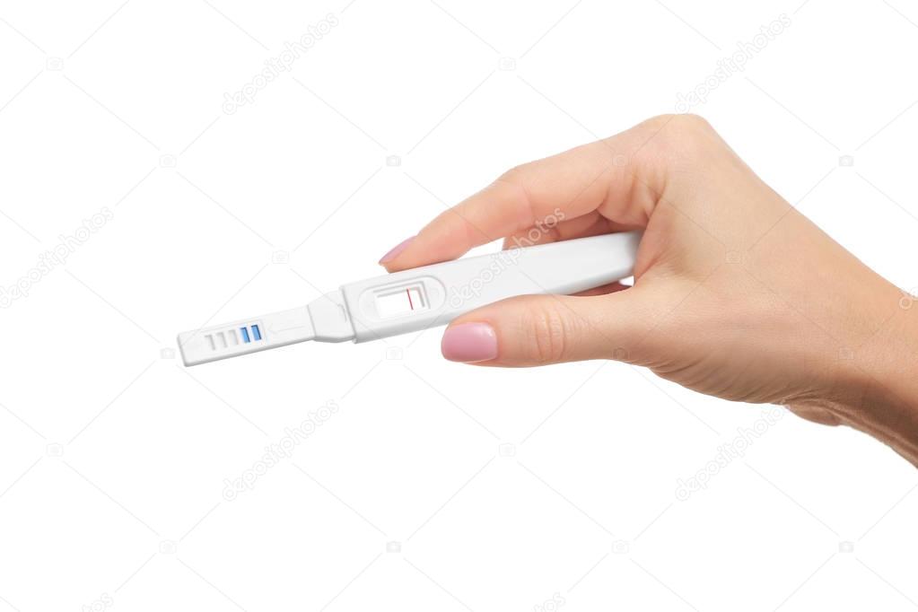 Pregnancy test in hand 