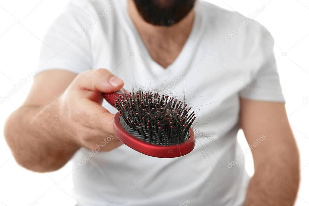man with hair brush