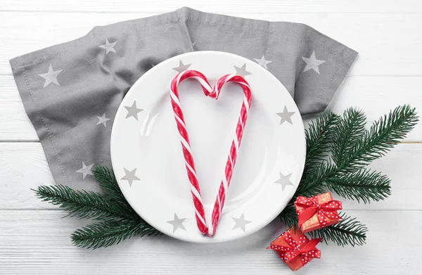Candy canes and Christmas decorations — Stock Photo, Image