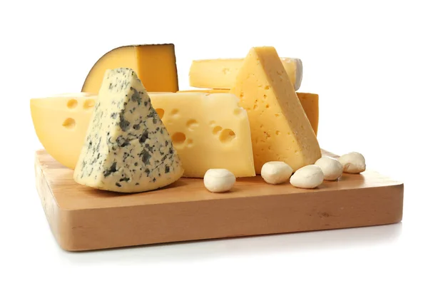 Assortment of cheese on wooden board — Stock Photo, Image