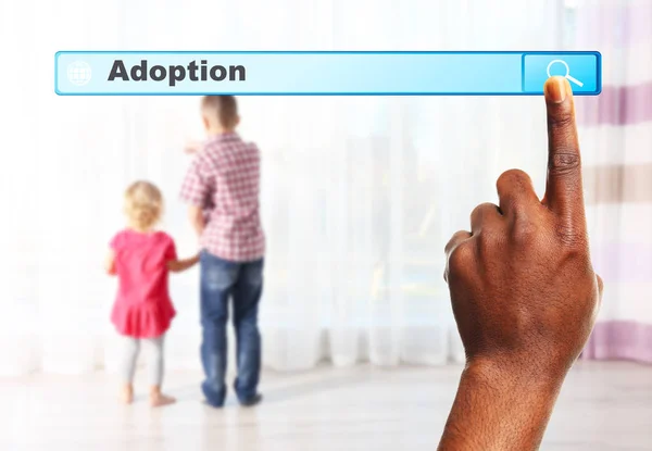 Adoption concept. Male hand pushing on search box — Stock Photo, Image