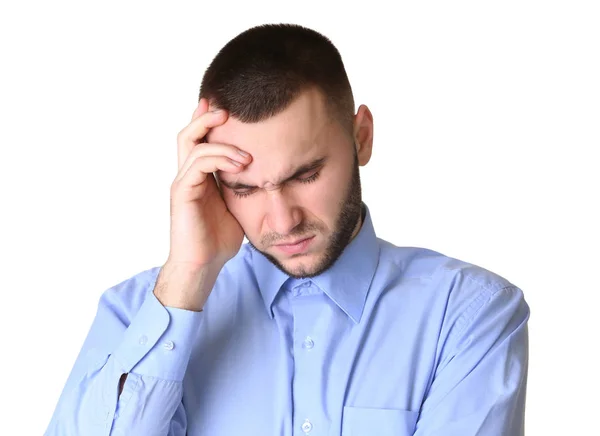 Handsome young man suffering from headache — Stock Photo, Image