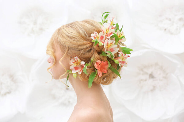 young woman with flowers in hair
