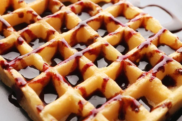 Delicious wafer cells with chocolate syrup — Stock Photo, Image