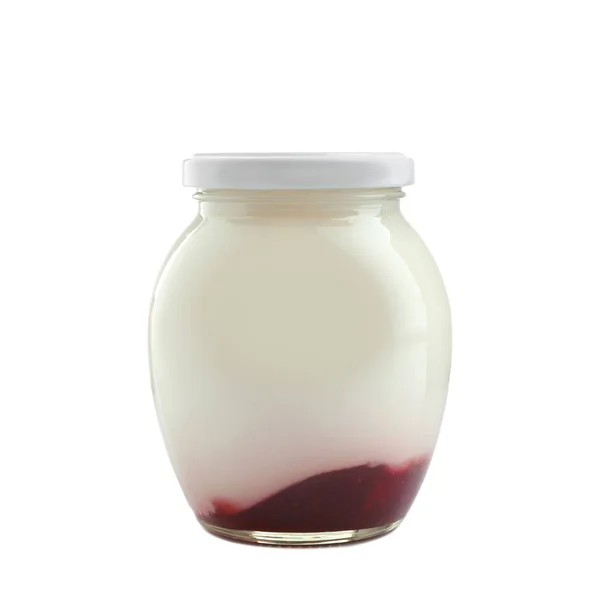 Скляна банка зі смачним йогуртом — стокове фото