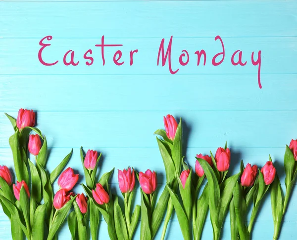 Text EASTER MONDAY and beautiful tulips — Stock Photo, Image