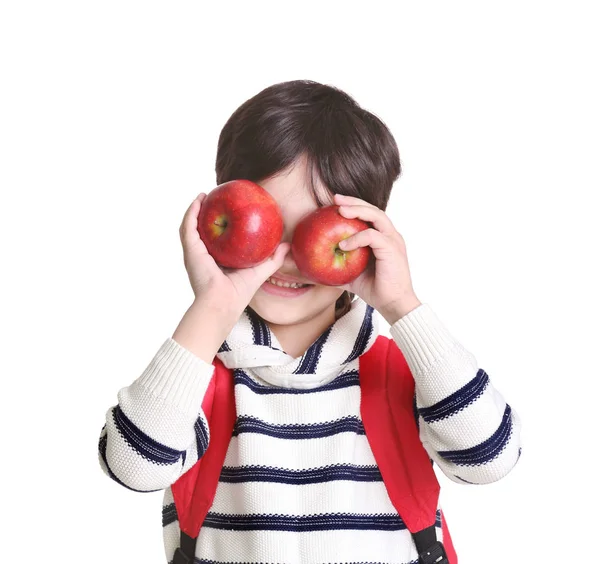 Piccolo scolaro con mele — Foto Stock