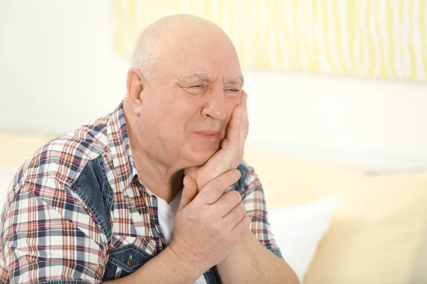 Mature man suffering from pain — Stock Photo, Image