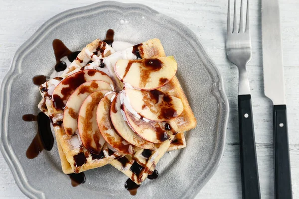 Delicious waffles with apple slices — Stock Photo, Image