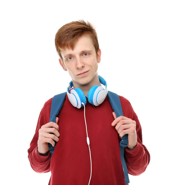 Adolescente con cuffie su bianco — Foto Stock